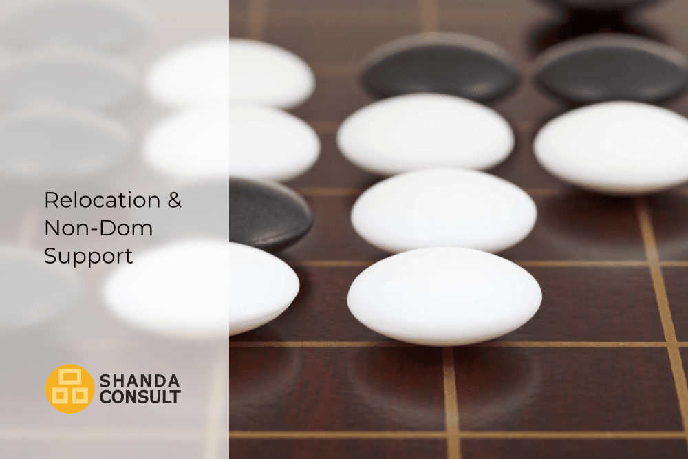 Go stones positioned strategically on a board representing relocation and Non-Dom support for entrepreneurs and high-net-worth individuals.